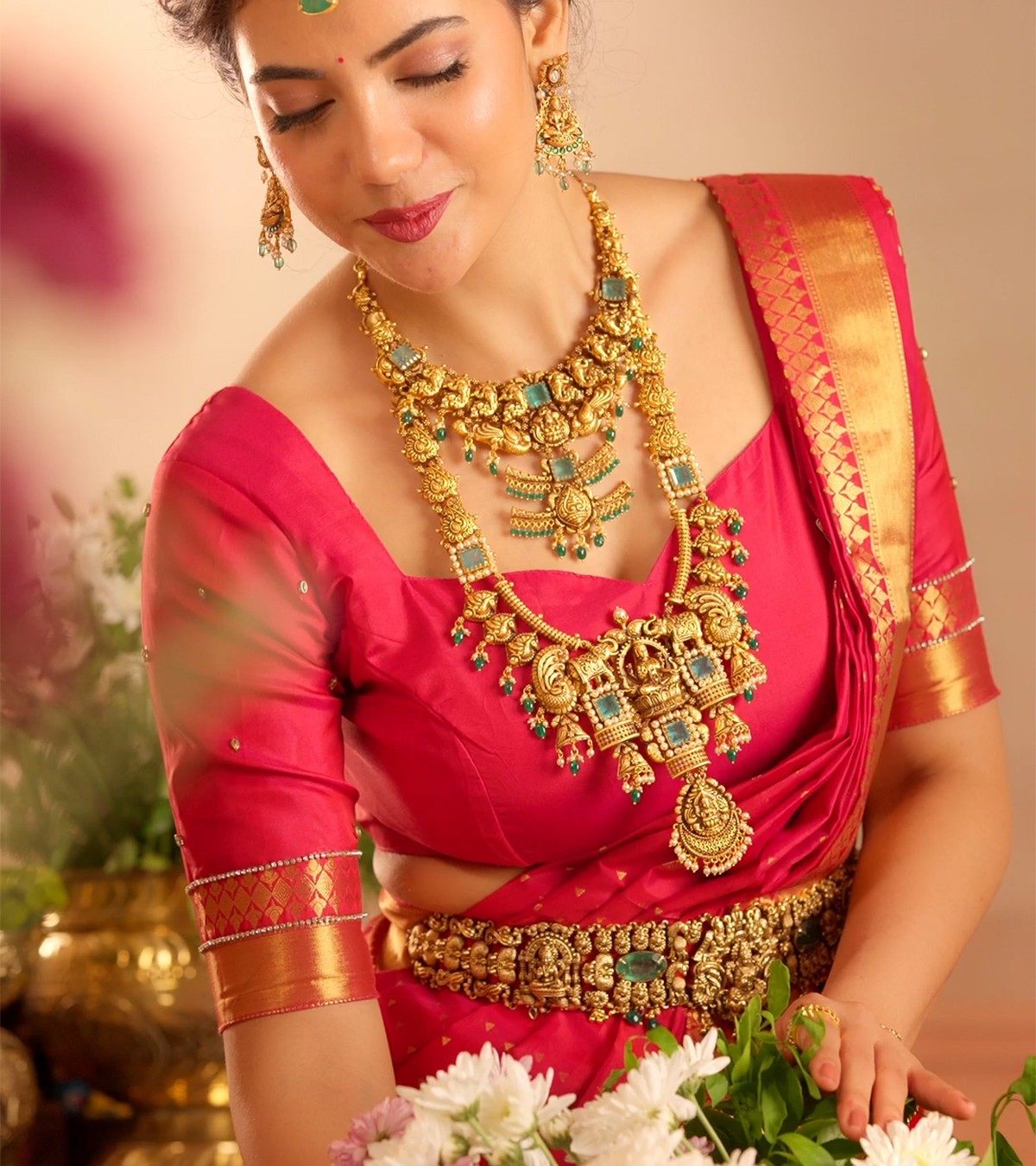Bride wearing a temple haram, necklace and oddiyanam in gold-plated 925 silver - Vilva Jewels Chennai